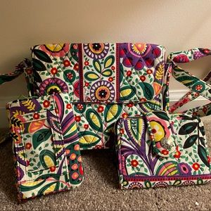 Three-piece shoulder bag set with wallet and change purse/wallet.